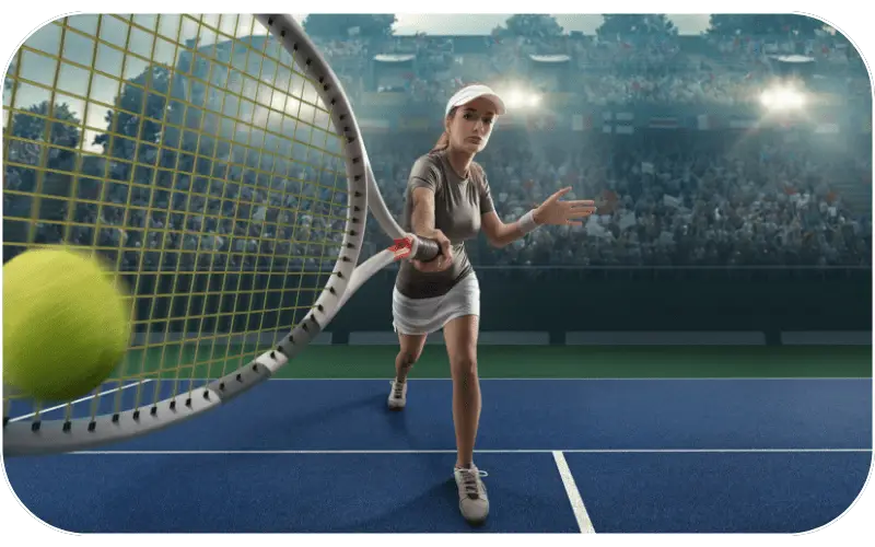 Female tennis player striking a forehand on court